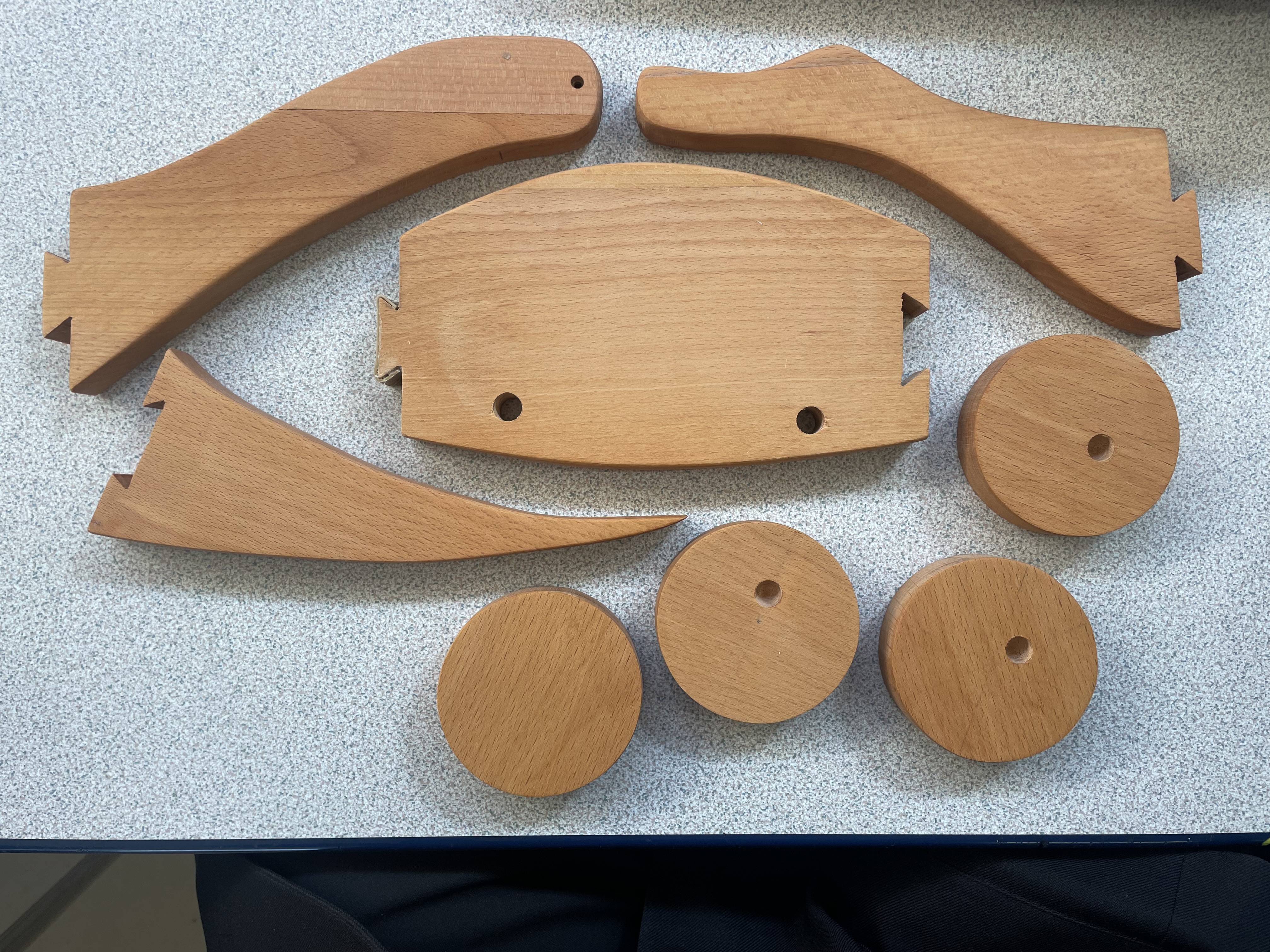 All wooden components laid out before assembly